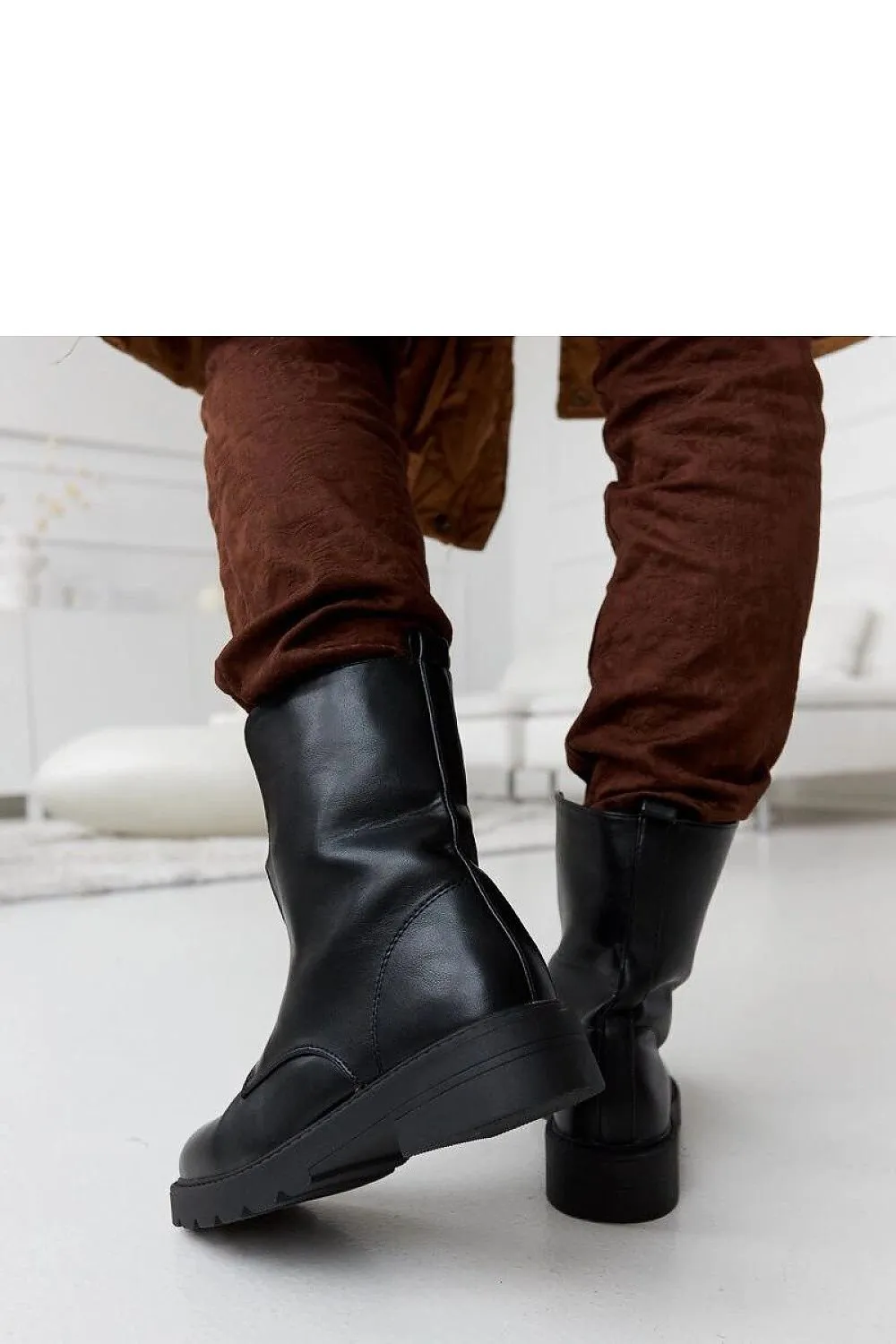 Black insulated ankle boots with a zipper
