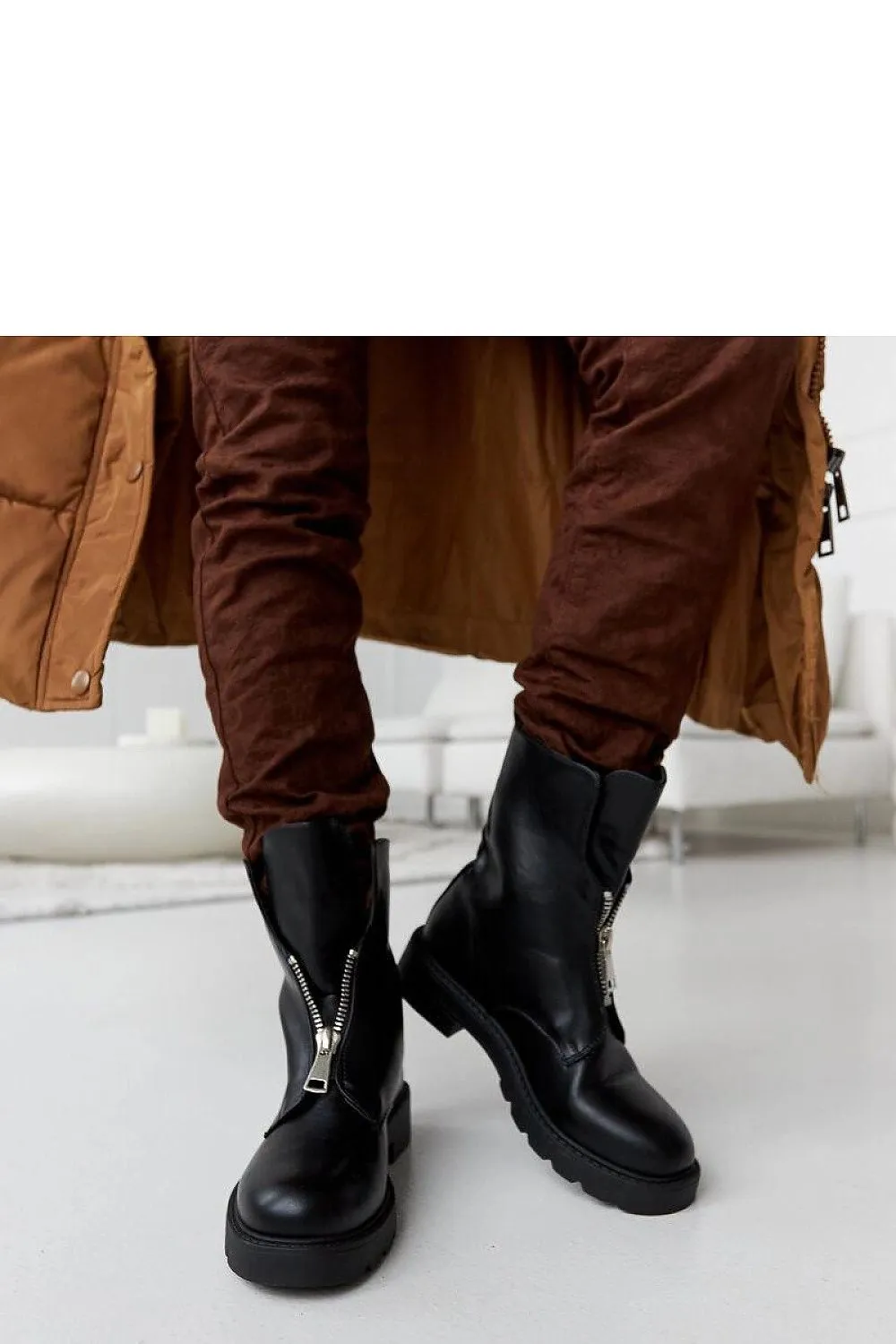 Black insulated ankle boots with a zipper