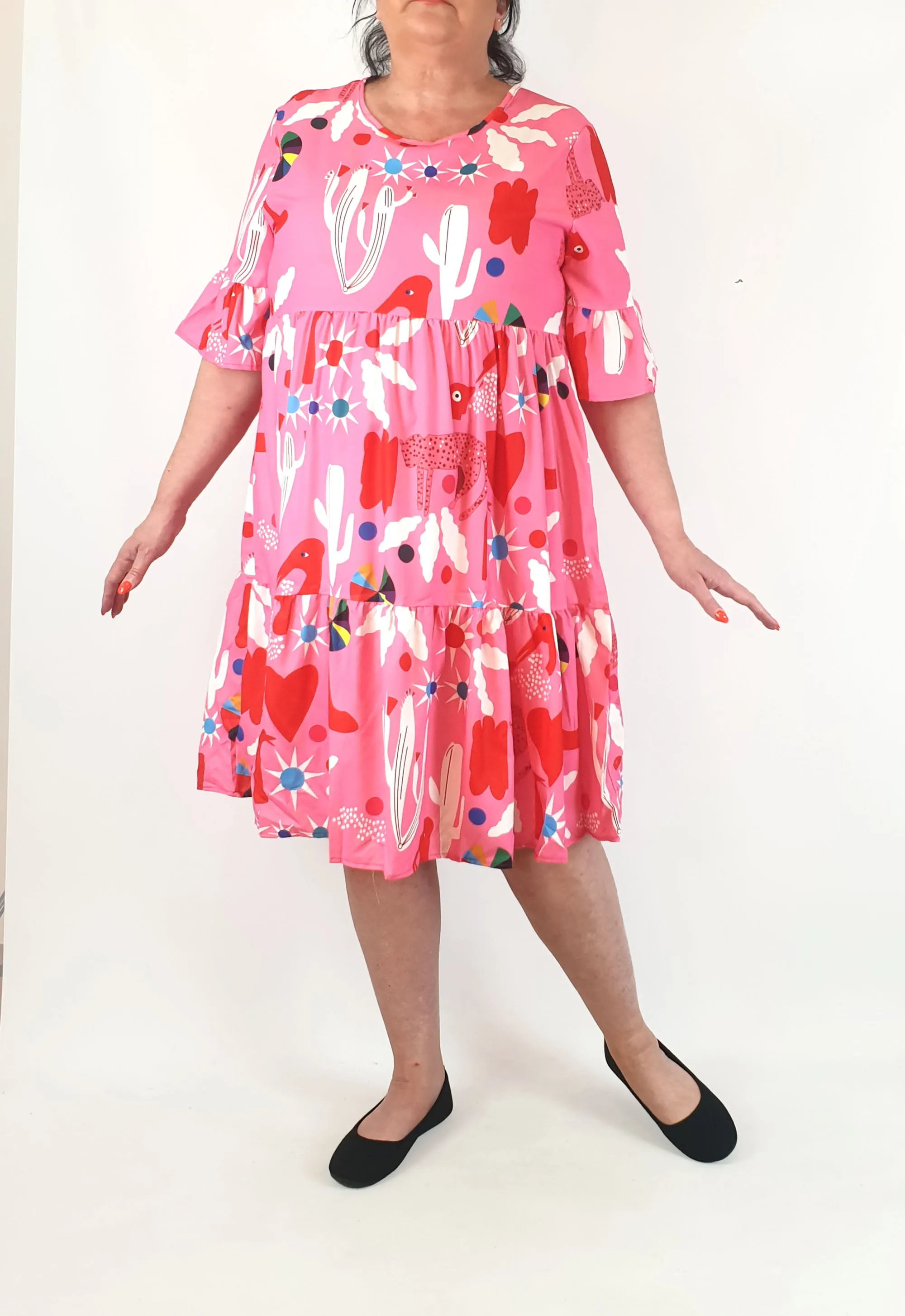Stunning pink half sleeve dress with unique print, fits size 16-18